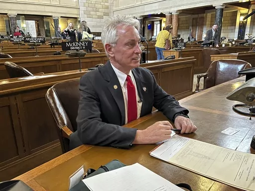 Nebraska state Sen. Loren Lippincott, of Central City, sits at his desk on the floor of the Nebraska State Capitol, Friday, Jan. 5, 2024 in Lincoln, Neb.. Lippincott has introduced a bill to add asphyxiation by nitrogen to the state's method of carrying out the death penalty. The measure comes even as Alabama officials await a judge's ruling on a request to block its plans to become the nation's first state to carry out an execution by nitrogen gas. (AP Photo/Margery Beck)