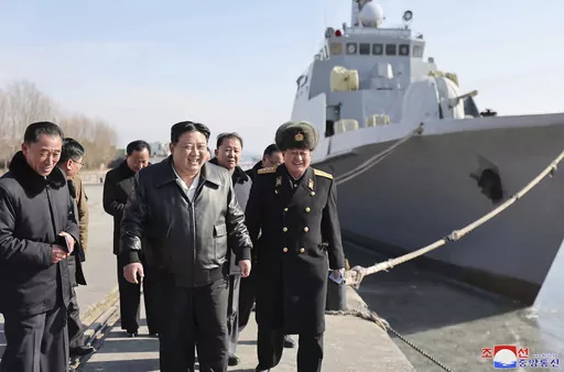 This undated photo provided on Feb. 2, 2024, by the North Korean government, North Korean leader Kim Jong Un, center, visits a shipyard in Nampho, North Korea. Independent journalists were not given access to cover the event depicted in this image distributed by the North Korean government. The content of this image is as provided and cannot be independently verified. Korean language watermark on image as provided by source reads: "KCNA" which is the abbreviation for Korean Central News Agency. 