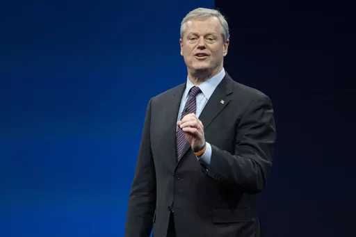 Incoming NCAA president Charlie Baker speaks during the NCAA Convention, Thursday, Jan. 12, 2023, in San Antonio. NCAA President Charlie Baker wants a federal law to regulate the way college athletes can be compensated for name, image and likeness that creates a registry of deals, agent certification and uniform contract standards. (AP Photo/Darren Abate, File)