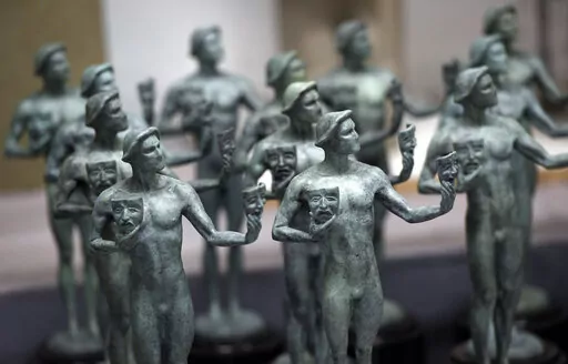 Finished solid bronze Actor statuettes are displayed during the 25th Annual Casting of the Screen Actors Guild Awards at American Fine Arts Foundry, Tuesday, Jan. 15, 2019, in Burbank, Calif.  The 2022 SAG Awards are scheduled to take place on Feb. 27. (Photo by Chris Pizzello/Invision/AP, File)