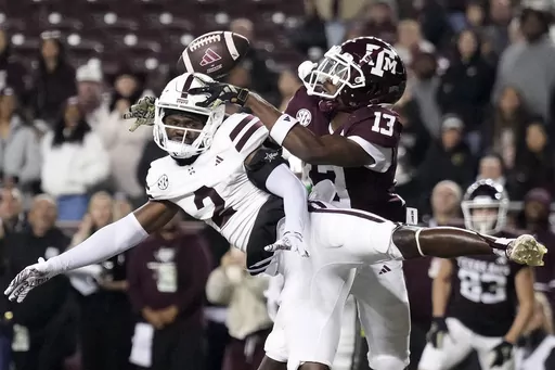 Mississippi State cornerback Esaias Furdge (2) breaks up a pass intended for Texas A&M wide receiver Micah Tease (13) in the end zone during the fourth quarter of an NCAA college football game Saturday, Nov. 11, 2023, in College Station, Texas. (AP Photo/Sam Craft)