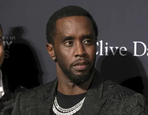 Sean Combs arrives at the Pre-Grammy Gala And Salute To Industry Icons at the Beverly Hilton Hotel on Saturday, Jan. 25, 2020, in Beverly Hills, Calif. (Photo by Mark Von Holden/Invision/AP, File)