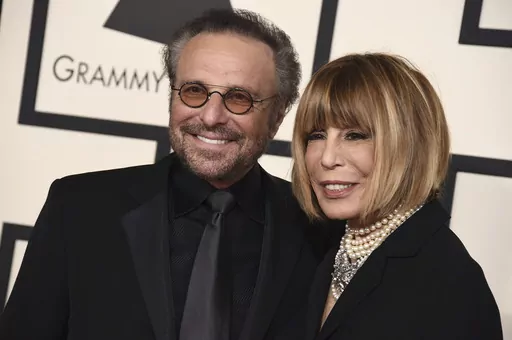 Barry Mann, left, and Cynthia Weil arrive at the 57th annual Grammy Awards at the Staples Center on Sunday, Feb. 8, 2015, in Los Angeles. Weil, a Grammy-winning lyricist of great range and endurance who enjoyed a decades-long partnership with husband Mann and helped write "You've Lost That Lovin' Feeling," "On Broadway," "Walking in the Rain" and dozens of other hits, has died at age 82. Weil and Mann, married in 1961, were one of popular music's most successful teams. (Photo by Jordan Strauss/I