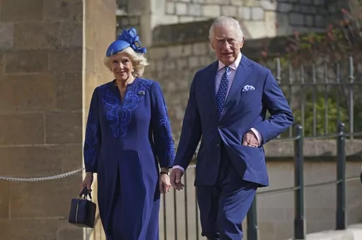 Britain's King Charles III and Camilla, the Queen Consort attend the Easter Mattins Service at St George's Chapel at Windsor Castle in Windsor, England, Sunday April 9, 2023. King Charles III will be taking a short cut and a smoother ride to Westminster Abbey on May 6, 2023, trimming the procession route his mother took in 1953 as he aims for a more modest coronation that will include some modern touches. (Yui Mok/Pool via AP, File)