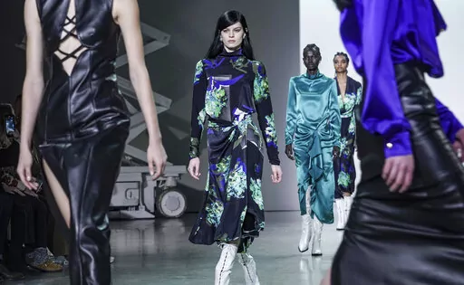 Fashion from Prabal Gurung is modeled during Fashion Week, Wednesday, Feb. 16, 2022, in New York. (AP Photo/Bebeto Matthews)