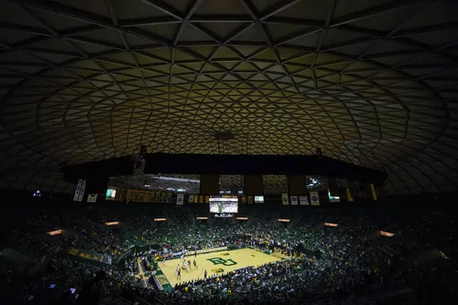 A crowd watches the first half of an NCAA college basketball game between Baylor and Mississippi Valley State, Friday, Dec. 22, 2023, in Waco, Texas. The game marks the final basketball matchup at the venue as the Baylor basketball team is scheduled to begin playing at Foster Pavilion. (AP Photo/Julio Cortez)