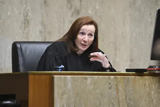 Oakland County Circuit Judge Martha D. Anderson respondes to an objection from a defense attorney during the involuntary manslaughter trial of three Northland Mall security guards who were charged with killing a black man at the mall. Oakland County Circuit on Tuesday, Aug. 20, 2024, in Pontiac, Mich. (Clarence Tabb, Jr./Detroit News via AP, File)