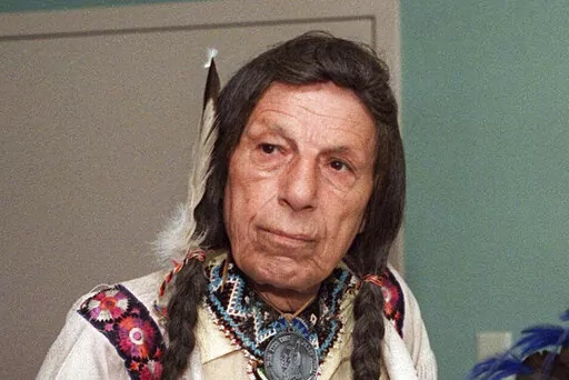 Iron Eyes Cody, the ''Crying Indian'' whose tearful face in 1970s TV commercials became a powerful symbol of the anti-littering campaign, is pictured in this 1986 photo. Keep America Beautiful, the nonprofit that originally commissioned the advertisement, announced Thursday, Feb. 23, 2023, that ownership of the ad's rights will be transferred to the National Congress of American Indians. (AP Photo/File)