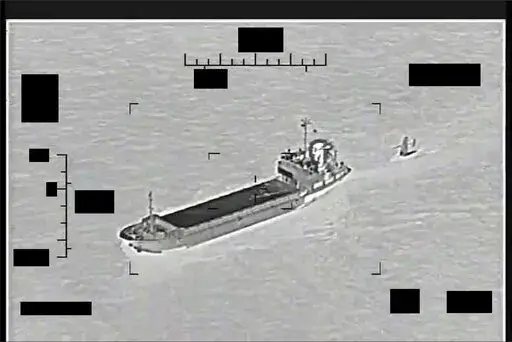 This photo released by the U.S. Navy shows the Iranian Revolutionary Guard ship Shahid Bazair, left, towing a U.S. Navy Saildrone Explorer in the Persian Gulf on Tuesday, Aug. 30, 2022. The U.S. Navy's Mideast-based 5th Fleet said Tuesday that Iran's paramilitary Revolutionary Guard seized and later let go of a U.S. sea drone in the Persian Gulf. Iran did not immediately acknowledge the incident, though it comes amid heightened tensions over Tehran's tattered nuclear deal with world powers. (U.S