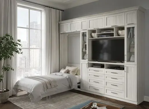This image provided by California Closets shows a room with a bed built into a cabinet. A horizontal tilt wall bed with built-in cabinets for TV and more helps organize a studio apartment and keeps the sleeping area in its own space. (California Closets via AP)