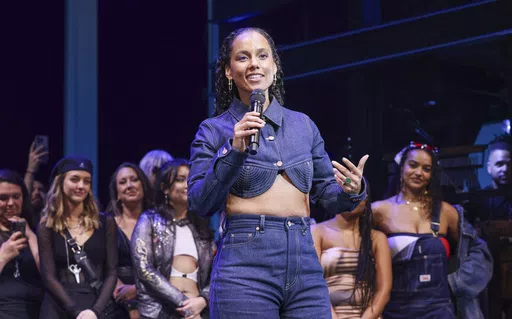 Singer Alicia Keys, center, takes a bow during the curtain call on the opening night of "Hell's Kitchen" Broadway musical at the Shubert Theatre on Saturday, April 20, 2024, in New York. (Photo by CJ Rivera/Invision/AP)