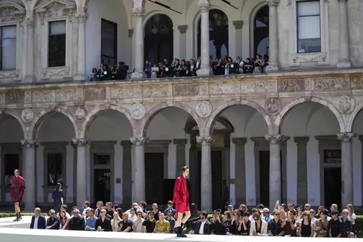 Models wear creations as part of the Valentino men's Spring Summer 2024 collection presented in Milan, Italy, Friday, June 16, 2023. (AP Photo/Luca Bruno)