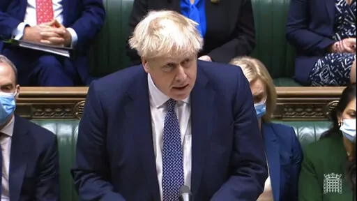 In this grab taken from video, Britain's Prime Minister Boris Johnson makes a statement ahead of Prime Minister's Questions in the House of Commons, London, Wednesday,  Jan. 12, 2022.  Johnson has apologized for attending a garden party during Britain’s coronavirus lockdown. He said Wednesday that there are things the government “did not get right.” Johnson is facing anger from public and politicians over claims he and his staff flouted pandemic restrictions by socializing when it was bann