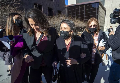 Relatives of victims of the August 2019 Walmart mass shooting, who declined to speak to the media, leave the federal court in El Paso, Texas, Wednesday, Feb. 8, 2023. Defendant Patrick Crusius pleaded guilty to federal charges accusing him of killing 23 people in the racist attack, changing his plea weeks after the U.S. government said it wouldn't seek the death penalty for the hate crimes and firearms violations. (AP Photo/Andrés Leighton)