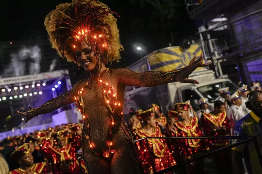 Drum queen Mayara Lima from Paraiso do Tuiuti samba school performs during Carnival celebrations at the Sambadrome in Rio de Janeiro, Brazil, Tuesday, Feb. 13, 2024. (AP Photo/Silvia Izquierdo)
