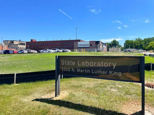 This July 2022 photo shows a lab in Lansing, Mich., where the state health department tests blood from newborns for more than 50 rare diseases. The state has agreed to destroy more than 3 million dried blood spots that are in storage. It's a partial settlement in an ongoing lawsuit over privacy, consent and the use of blood spots for research. The agreement doesn't cover millions more spots that are stored in Detroit.(Joey Cappelletti/Report for America via AP)