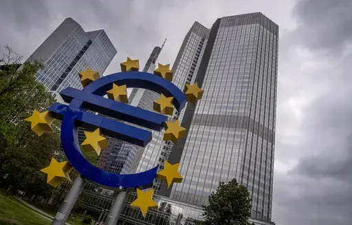 The Euro sculpture stands in front of the former headquarters of the European Central Bank (ECB) in Frankfurt, Germany, Tuesday, May 23, 2023. (AP Photo/Michael Probst, File)