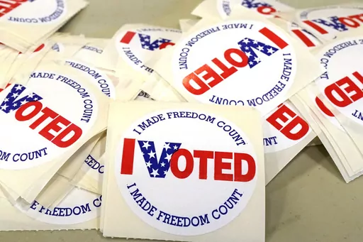 "I Voted" stickers are ready to be distributed to each person who filled out their ballot, Tuesday, Nov. 8, 2022, at a Brandon, Miss., precinct. Mississippi is violating the U.S. Constitution's ban on cruel and unusual punishment by permanently stripping voting rights from people convicted of some felonies, a federal appeals court panel ruled in a split decision Friday, Aug. 4, 2023. (AP Photo/Rogelio V. Solis, File)