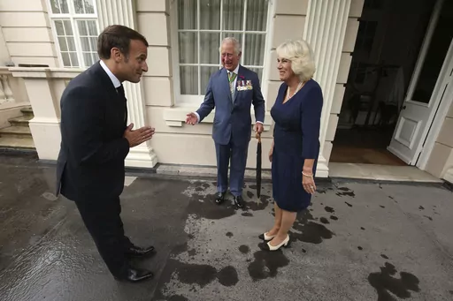 Britain's Prince Charles and Camilla, Duchess of Cornwall welcome French president Emmanuel Macron to Clarence House in London, Thursday June 18, 2020. Unrest in France is tarnishing the sheen of King Charles III’s first overseas trip as monarch. Striking workers have refused to provide red carpets and critics are calling for the British king's visit to be canceled altogether amid pension reform protests. (Jonathan Brady/Pool via AP, File)