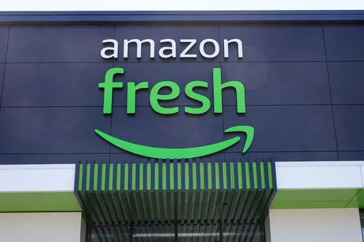 An Amazon Fresh grocery store in Warrington, Pa., April 28, 2022. Amazon has begun offering its Fresh grocery delivery service to customers who aren’t Prime members. The initial rollout will only be available in a dozen cities, including Boston, Phoenix, Dallas and San Francisco, the company told customers Wednesday, Aug. 2, 2023, in an emailed announcement. (AP Photo/Matt Rourke, File)