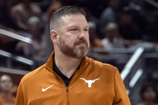 Texas head coach Chris Beard looks on during the first half an NCAA college basketball game against UTEP on Nov. 7, 2022, in Austin, Texas. Mississippi has hired Chris Beard as basketball coach five weeks after his firing from Texas following a domestic violence arrest. The Rebels announced Beard's hiring on Monday, March 13, 2023, and will introduce him Tuesday in a public event at the SBJ Pavilion. (AP Photo/Michael Thomas, File)