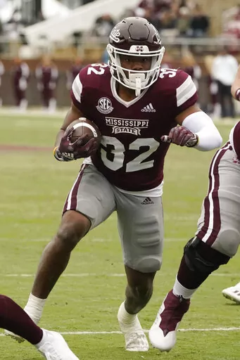 Mississippi State running back J.J. Jernighan (32) runs into the end zone for a two-yard touchdown pass reception during the second half of an NCAA college football game against East Tennessee State in Starkville, Miss., Saturday, Nov. 19, 2022. Mississippi State won 56-7. (AP Photo/Rogelio V. Solis)