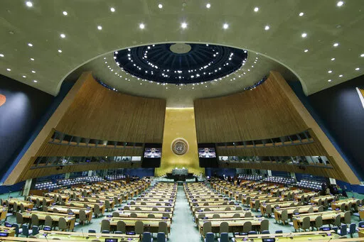 The United Nations General Assembly Hall sits empty before the start of the 76th Session of the General Assembly at U.N. headquarters on Sept. 20, 2021, in New York. A key U.N. committee has again blocked Myanmar’s military junta from taking the country’s seat at the United Nations, two well-informed U.N. diplomats said Wednesday, Dec. 14, 2022. (John Angelillo/Pool via AP, File)