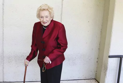 Native Hawaiian heiress Abigail Kawananakoa poses outside a Honolulu courthouse on Oct. 25, 2019. Kawananakoa, the so-called last Hawaiian princess whose lineage included the royal family that once ruled the islands and an Irish businessman who became one of Hawaii’s largest landowners, died on Sunday, Dec. 11, 2022. She was 96. (AP Photo/Jennifer Sinco Kelleher, File)
