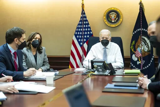 In this image provided by The White House, President Joe Biden and Vice President Kamala Harris and members of the President's national security team observe from the Situation Room at the White House in Washington, on Feb. 2, 2022, the counterterrorism operation responsible for removing from the battlefield Abu Ibrahim al-Hashimi al-Qurayshi, the leader of the Islamic State group. Biden and top national security officials have cited the recent strike killing al-Qaida head Ayman al-Zawahri as ev