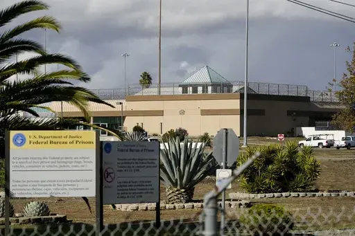 The Federal Correctional Institution stands in Dublin, Calif., Dec. 5, 2022. The federal Bureau of Prisons is permanently closing its “rape club” women’s prison in California and will idle six other facilities in a sweeping realignment after years of abuse, decay and mismanagement, the Associated Press has learned. (AP Photo/Jeff Chiu, File)