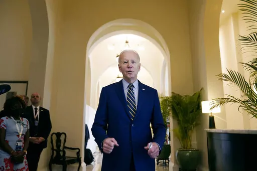 President Joe Biden smiles as he speaks about democratic control of the Senate before leaving his hotel to attend the Association of Southeast Asian Nations (ASEAN) summit, Sunday, Nov. 13, 2022, in Phnom Penh, Cambodia. (AP Photo/Alex Brandon)