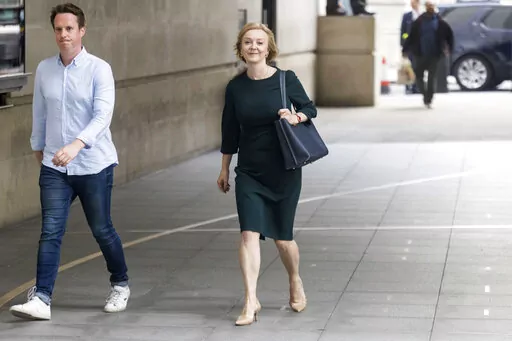 Liz Truss arrives at BBC Broadcasting House in London, to appear on the BBC One current affairs programme, Sunday with Laura Kuenssberg, Sunday Sept. 4, 2022. (James Manning/PA via AP)