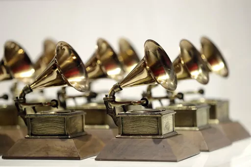 Grammy Awards are displayed at the Grammy Museum Experience at Prudential Center in Newark, N.J. on Oct. 10, 2017. The Recording Academy has announced three new categories to be added to the 2024 Grammy Awards: Best Pop Dance Recording, Best African Music Performance, and Best Alternative Jazz Album. (AP Photo/Julio Cortez, File)