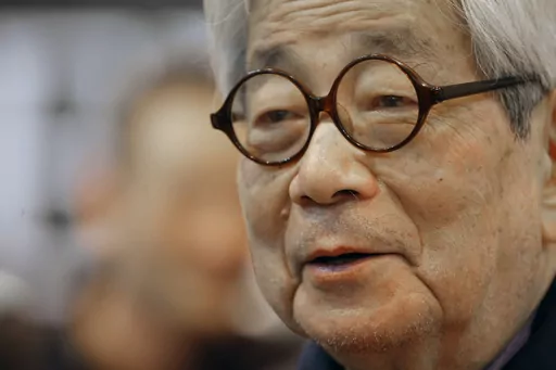 Japanese Nobel Prize winning author Kenzaburo Oe poses during the inauguration of the 32nd Paris Book Fair, which focused on Japanese writers, March 15, 2012. Japanese publisher Kodansha Ltd. said Monday, March 13, 2023 that Nobel literature laureate Kenzaburo Oe died of old age. Oe's darkly poetic novels were built from a childhood during Japan’s postwar occupation and parenthood with a disabled son. (AP Photo/Jacques Brinon, File)