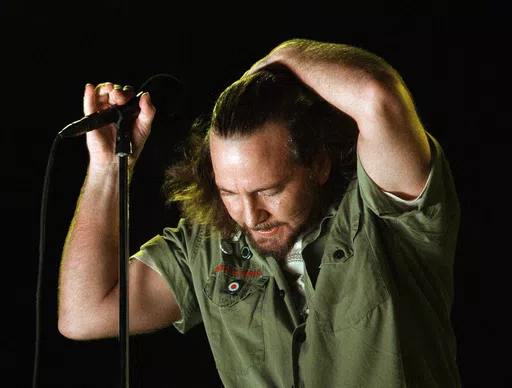 Pearl Jam lead singer Eddie Vedder performs at the Bonnaroo music festival in Manchester, Tenn., June 14, 2008. In 1994 Pearl Jam filed a complaint against Ticketmaster with the Justice Department, claiming that the company used its position in the industry to stop promoters from booking the band because they railed against Ticketmaster's pricing. (AP Photo/Mark Humphrey, File)