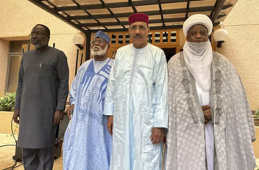 From left; President of the ECOWAS Commission, Mousa Tourey, ECOWAS Special Envoy to Republic of Niger, General Abdulsalami Abubakar, Niger ousted President Mohamed Bazoum and Sultan of Sokoto Alhaji Muhammad Saad Abubakar III, pose in Niamey, Niger, Saturday, Aug. 19, 2023. An official present at talks between Niger's mutinous soldiers and a delegation from West Africa's regional bloc tells The Associated Press that talks Saturday, Aug. 19, 2023, yielded little and that the soldiers are under p