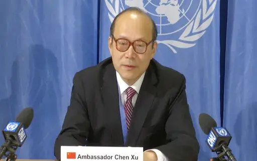 China's ambassador in Geneva ambassador Chen Xu makes a media statement criticising the U.S. for attacking China's candidate to head a United Nations agency that tracks intellectual property in the digital age, in Geneva, Switzerland, Feb. 26, 2020. Like rarely before, Western countries are leading a push among the 47 member nations of the U.N.’s top human rights body to single out and scrutinize human rights in China — over allegations of abuses in western Xinjiang — and Russia, where a d