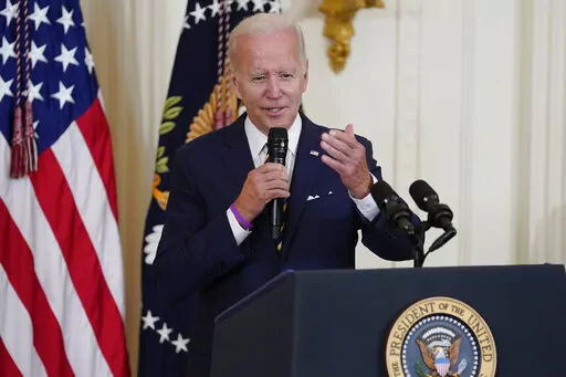 President Joe Biden speaks during an event in the East Room of the White House, Aug. 10, 2022, in Washington. Biden will host a White House summit next month aimed at combatting a spate of hate-fueled violence in the U.S., as he works to deliver on his campaign pledge to "heal the soul of the nation." (AP Photo/Evan Vucci, File)