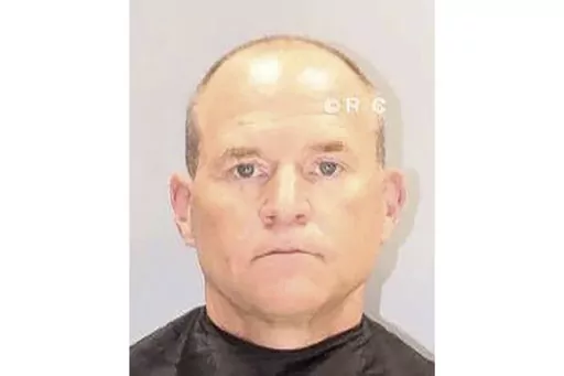 This undated mugshot provided by the Richland County Detention Center shows Cory Fleming. The longtime friend of convicted murderer Alex Murdaugh admitted Thursday, May 25, 2023, that he helped his old college roommate steal more than $4 million meant for a wrongful death settlement after Murdaugh's housekeeper died in a fall. (Richland County Detention Center via AP)