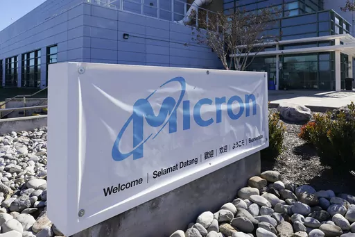 A sign marks the entrance of the Micron Technology automotive chip manufacturing plant on Feb. 11, 2022, in Manassas, Va. Stepping up a feud with Washington over technology and security, China's government on Sunday, May 21, 2023 told users of computer equipment deemed sensitive to stop buying products from the biggest U.S. memory chip maker, Micron Technology Inc. (AP Photo/Steve Helber, File)