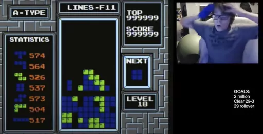 In this image taken from video, 13-year-old player named Willis Gibson reacts after playing a game of Tetris. Gibson, who in late December became the first player to officially “beat” the original Nintendo version of the game. By breaking it, of course. Technically, Gibson — aka “blue scuti” in the gaming world — made it to what gamers call a “kill screen,” a point where the Tetris code glitches, crashing the game. (Willis Gibson via AP)