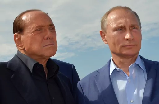 Russian President Vladimir Putin, right, and former Italian Prime Minister Silvio Berlusconi visit a memorial to the soldiers from Sardinia killed in the Crimean War, near Mount Gasfort outside Sevastopol in Crimea, Friday, Sept. 11, 2015. Berlusconi, the boastful billionaire media mogul who was Italy's longest-serving premier despite scandals over his sex-fueled parties and allegations of corruption, died, according to Italian media. He was 86.(Alexei Druzhinin/RIA-Novosti, Kremlin Pool Photo v