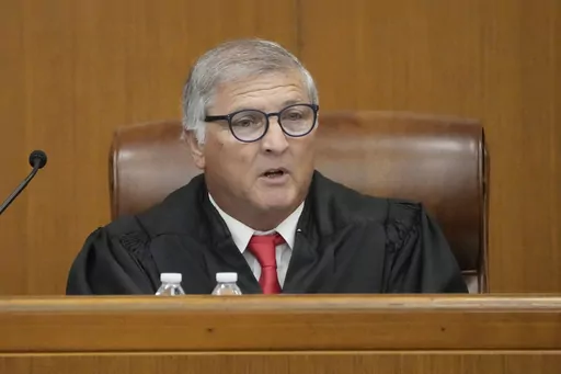 Hinds County Chancery Judge Dewayne Thomas speaks to the parties involved at a hearing, Wednesday, May 10, 2023, in Hinds County Chancery Court in Jackson, Miss., where he heard arguments about a Mississippi law that would create a court system with judges who would be appointed rather than elected. (AP Photo/Rogelio V. Solis)