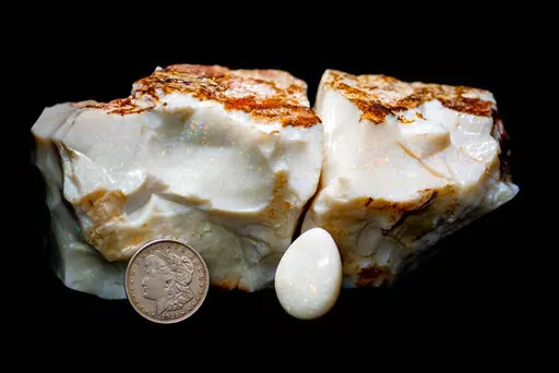 CORRECTS FIGURE THE OPAL SOLD FOR This photo provided by Alaska Premier Auctions and Appraisals shows an opal specimen, Dec. 20, 2021. One of the largest opals in the world was sold for nearly $144,000 at auction in Alaska on Sunday, Feb. 20, 2022. The opal, dubbed the “Americus Australis,” weighs more than 11,800 carats and is one of the largest gem-quality opals in existence, according to the auction house Alaska Premier Auctions & Appraisals. (Dana Fuentes/Alaska Premier Auctions and Appr