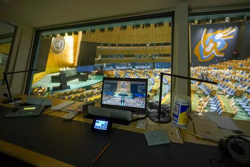 A translators booth overlooks the empty General Assembly hall at United Nations headquarters ahead of the General Assembly, Friday, Sept. 16, 2022. (AP Photo/Mary Altaffer)