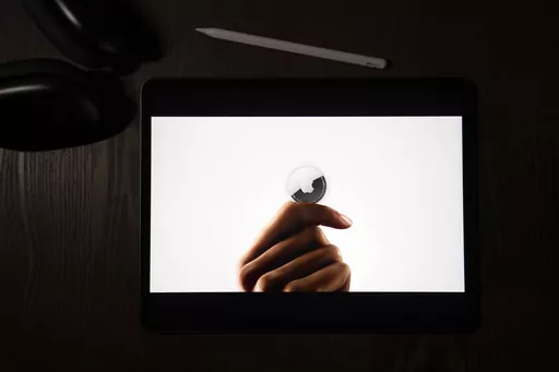 In this illustration photographed in La Habra, Calif., the AirTag tracking device is introduced during a virtual event held to announce new Apple products, Tuesday, April 20, 2021. On Friday, March 15, 2024, U.S. judge has denied Apple's motion to dismiss a class-action lawsuit claiming that stalkers are using AirTag devices to track victims — and that the tech giant hasn't done enough to prevent it. (AP Photo/Jae C. Hong, File)