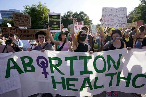 Demonstrators march and gather near the Texas state Capitol in Austin following the Supreme Court's decision to overturn Roe v. Wade on June 24, 2022. A pregnant Texas woman whose fetus has a fatal diagnosis asked a court Tuesday, Dec. 5, 2023, to let her terminate the pregnancy, bringing what her attorneys say is the first lawsuit of its kind in the U.S. since Roe v. Wade was overturned last year. (AP Photo/Eric Gay, File)