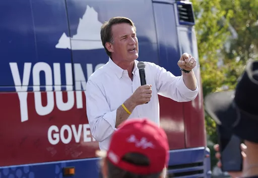 Virginia Gov. Glenn Youngkin addresses the crowd during an early voting rally Sept. 21, 2023, in Petersburg, Va. (AP Photo/Steve Helber, File)