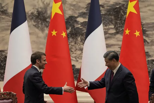 French President Emmanuel Macron, left, shakes hands with Chinese President Xi Jinping after meeting the press at the Great Hall of the People in Beijing, on April 6, 2023. In the weeks since Chinese leader Xi Jinping won a third five-year term as president, setting him on course to remain in power for life, leaders and diplomats from around the world have beaten a path to his door. None more so than those from Europe. (AP Photo/Ng Han Guan, Pool, File)