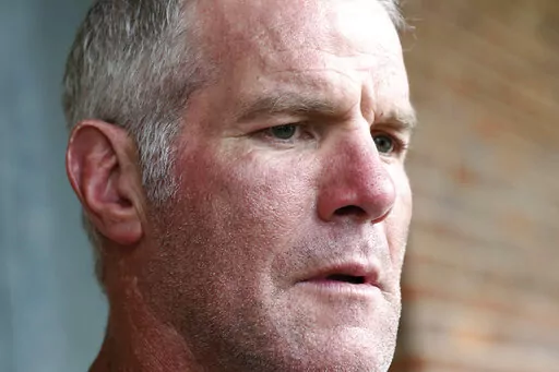 Former NFL quarterback Brett Favre speaks to the media in Jackson, Miss., Oct. 17, 2018. Favre's lawyers filed papers Friday, Feb. 10, 2023, again asking a Mississippi judge to dismiss the retired NFL quarterback from a lawsuit that demands repayment of millions of dollars of welfare money intended to help some of the poorest people in the U.S. (AP Photo/Rogelio V. Solis, File)